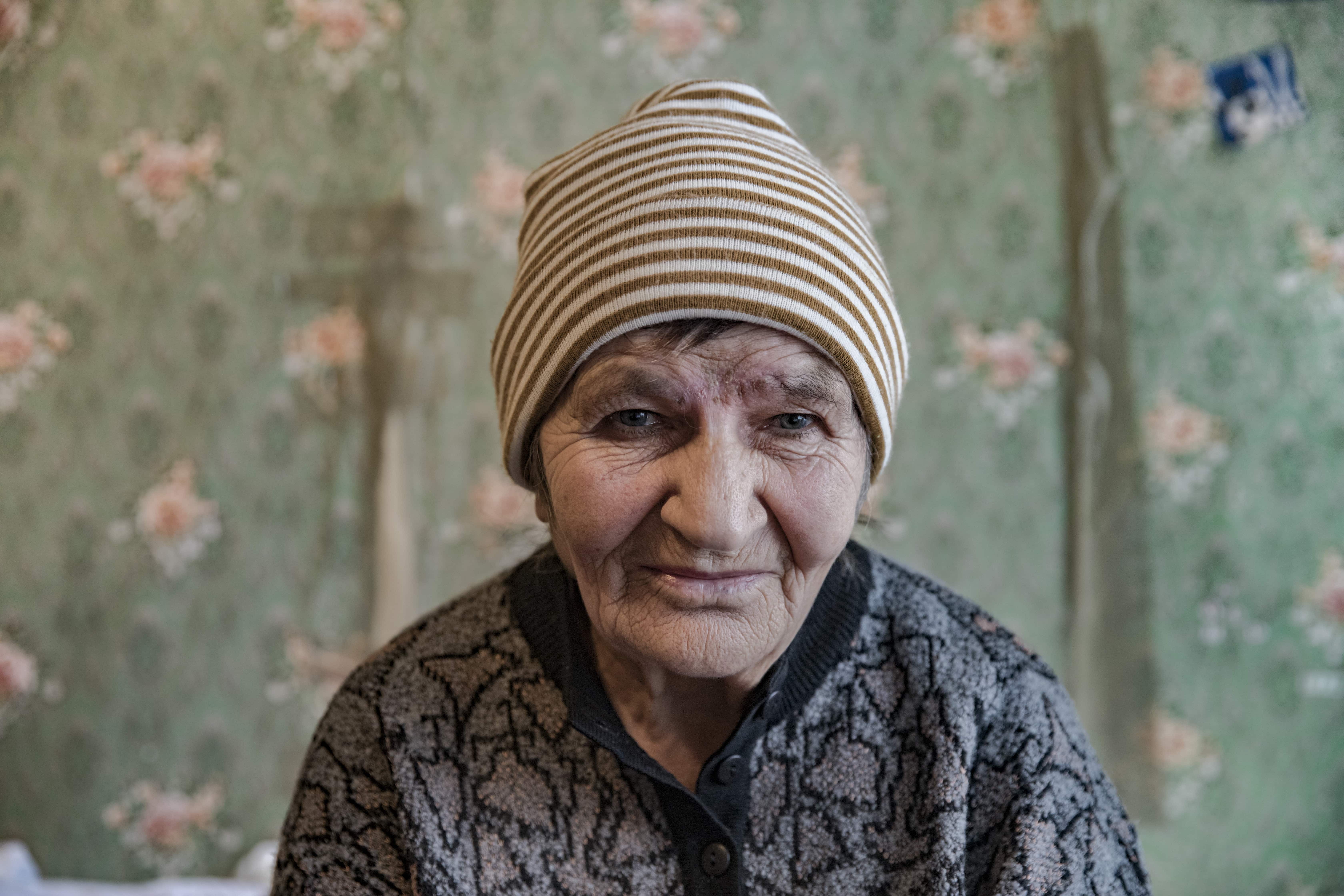 Maria 74, pictured in her family single room accommodation. 